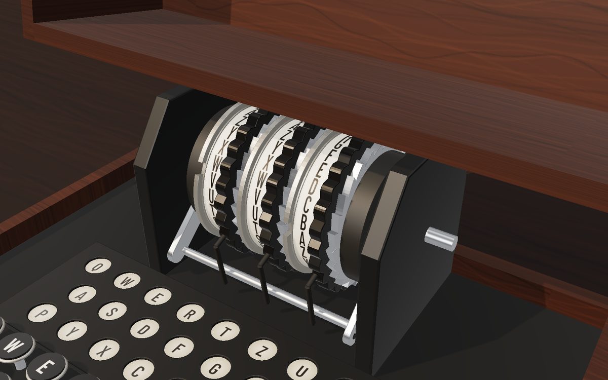Close-up of the three rotors mid-step, with letter rings, finger wheels and ratchets.